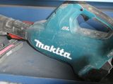 a blue machine that is sitting on top of a table