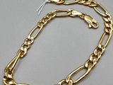 a gold chain bracelet with a clasp and clasp