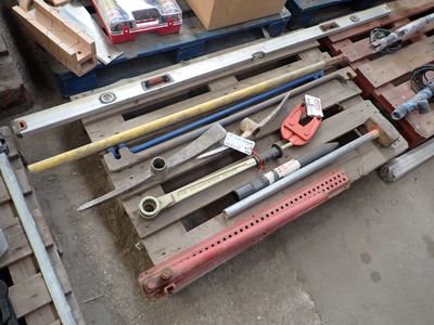a lot of tools that are on a pallet