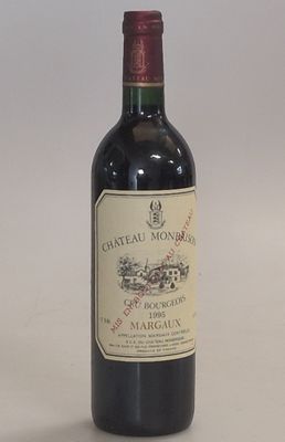 a bottle of wine that is sitting on a table
