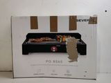 packaging of a box with a pizza on it sitting on a counter