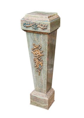 a tall vase with a decorative design on it