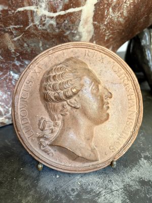 a close up of a coin sitting on top of a table