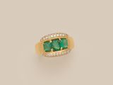 an emerald and diamond ring