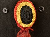 an image of a close up of a hat with a knot on it