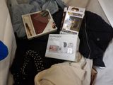 a lot of items that are laying out on the bed