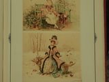 an open book with two pictures of women sitting on a bench