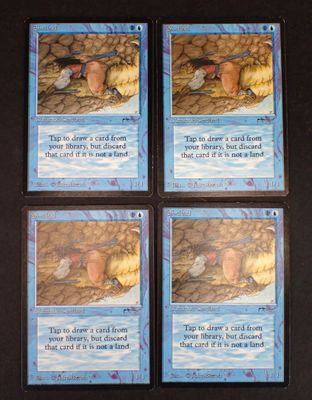 quatre cartes d'un jeu de cartes représentant un bébé dans un berceau