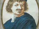 portrait of a man wearing a blue cap and a blue coat