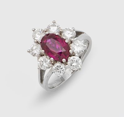 a ruby and diamond cluster ring