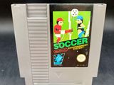 un vieux jeu Nintendo avec un footballeur sur la jaquette