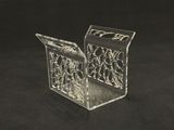 two clear acrylic bookends on a black background