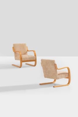 three chairs in the style of person, designed by person