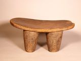 an image of a small wooden stool with two legs on a white background