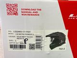 a box with a helmet on it sitting on the floor