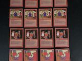 many cards with pictures of people on them on a table