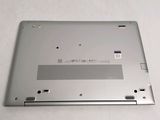 a silver laptop that is sitting on a table
