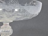 a glass bowl that has a design on it