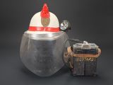 a fireman helmet and a box on a black background