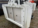 a picture of a window that has been removed from the back of a truck