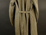 an old coat with a belt is shown on a mannequin mannequin mannequin mannequin mannequin mannequin mannequin mann
