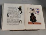 an open book with a picture of a woman in a dress