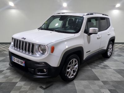 the white jeep is parked on a checkered tile floor