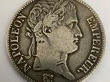 a close up of a coin with a woman ' s head on it