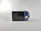 a small camera that is sitting on a table