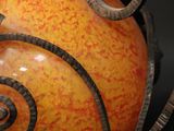 a vase that has a spiral design on it