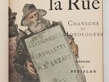 a book with a picture of a man holding a sign