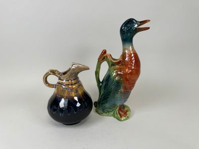 two vases that are sitting next to each other on a table