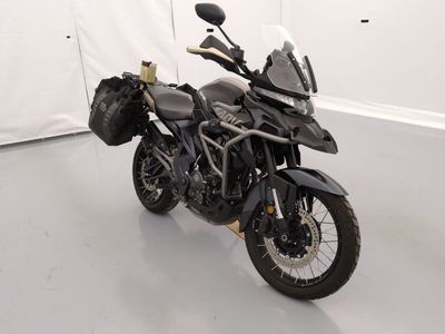 a motorcycle that is parked in a white room