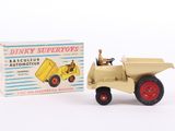 a toy truck with a box on the back of it