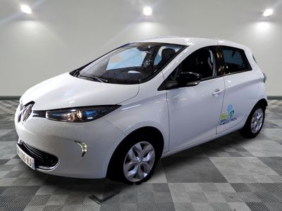 a picture of a white electric car on a checkered floor