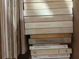 a box full of books sitting on the floor