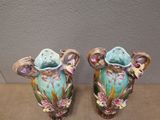 pair of antique hand painted porcelain vases with flowers on them
