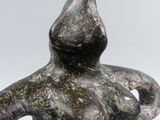 statue of a woman holding a baby in her arms