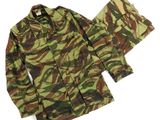 a camo uniform with a jacket and pants on a white background
