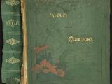 un vieux livre à la couverture verte posé sur une table