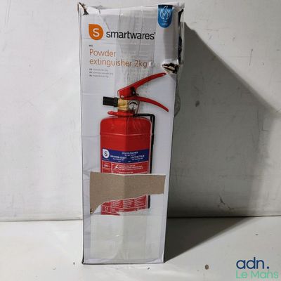 a red fire extinguisher in a cardboard box