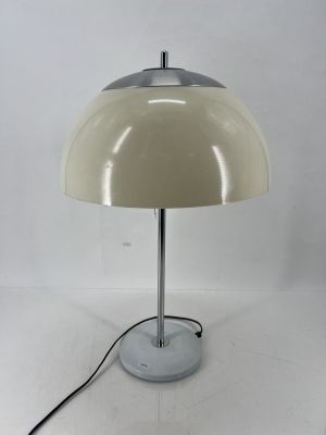 an image of a white table lamp on a white surface