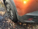 a close up of a car that has been badly damaged