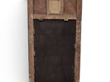 an old wooden frame with a blackboard on it