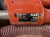 a close up of a hose and a red blow dryer