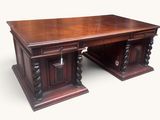 an image of a large wooden desk with two pedestals