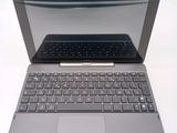 a laptop with a keyboard on the top of it