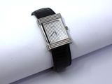 an image of a close up of a wrist watch on a napkin
