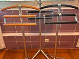 a picture of a rack of knives on a wooden floor