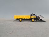 a toy truck with a shovel on the back of it